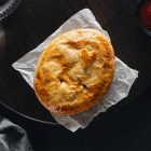 Pinjarra Bakery Chunky Pepper steak pie overflowing with tender chunks of primed steak, ground beef, and a bold, peppery flavour.